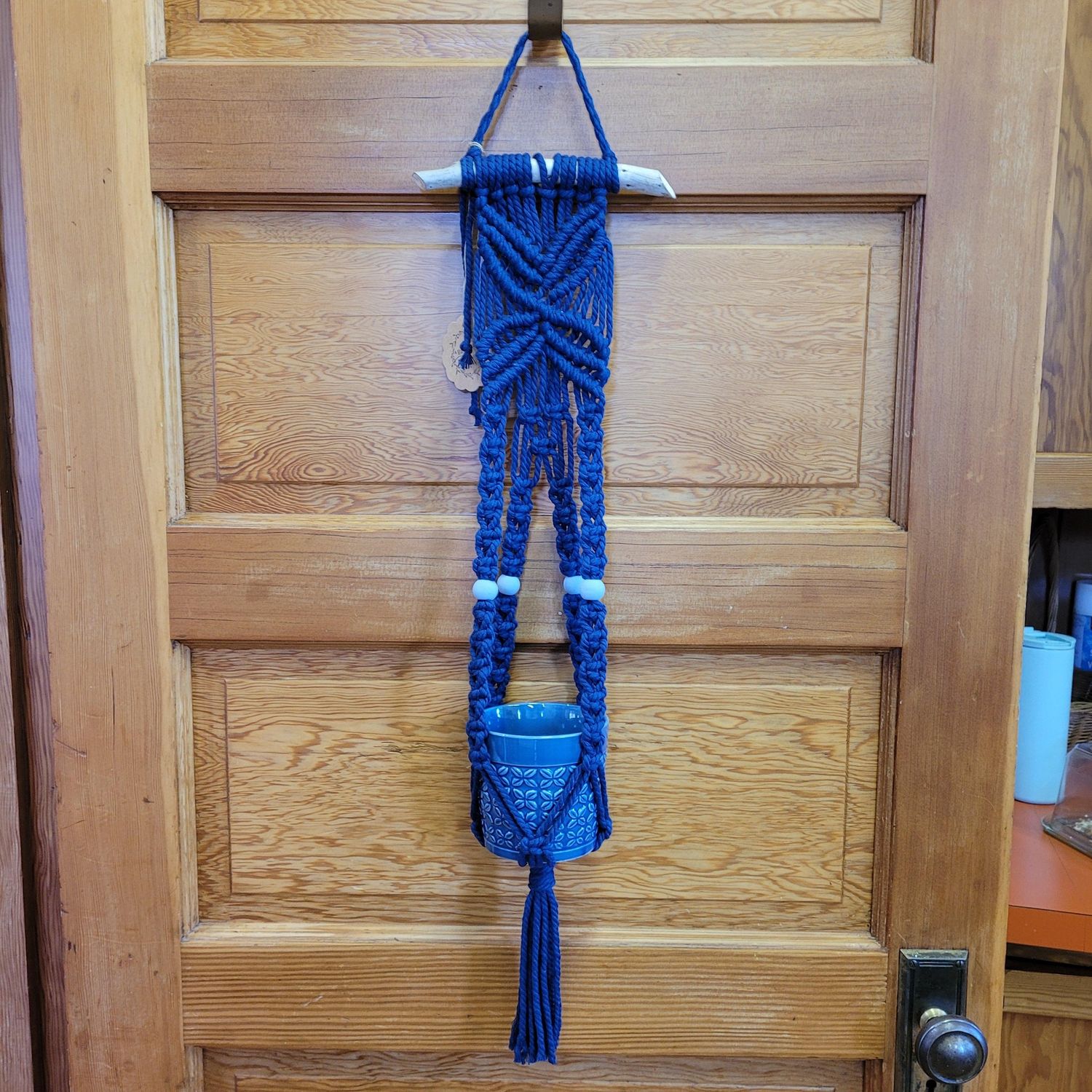 Navy macramé plant holder