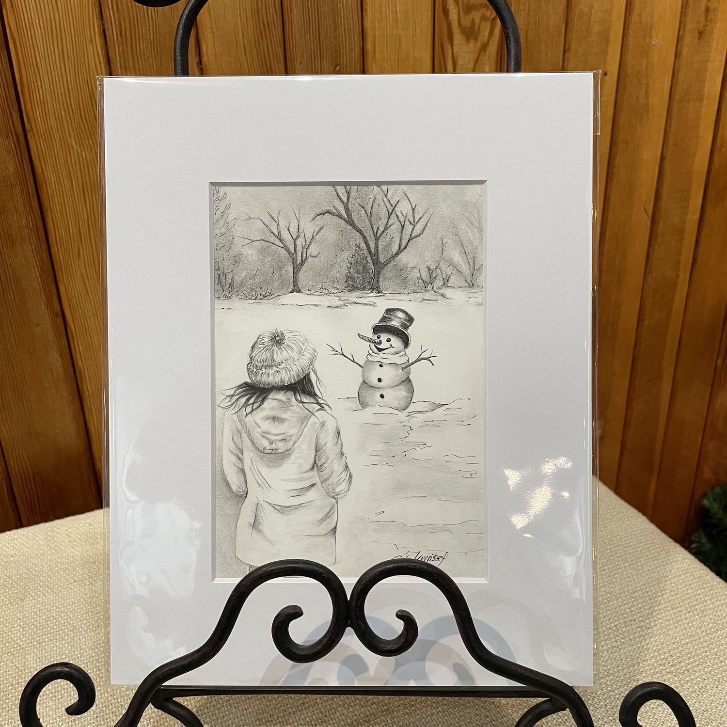 Snowman with little girl