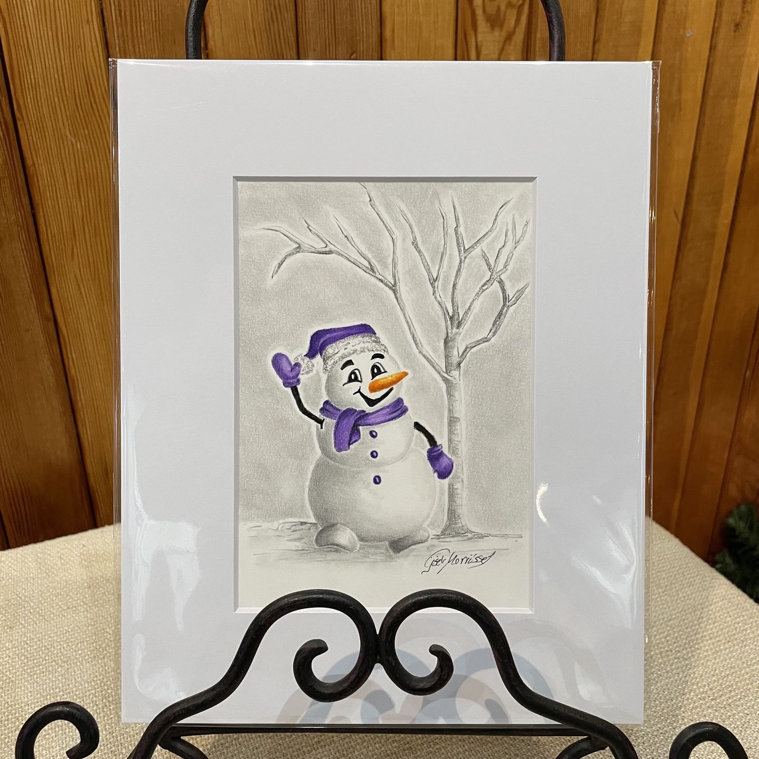 Snowman with purple scarf