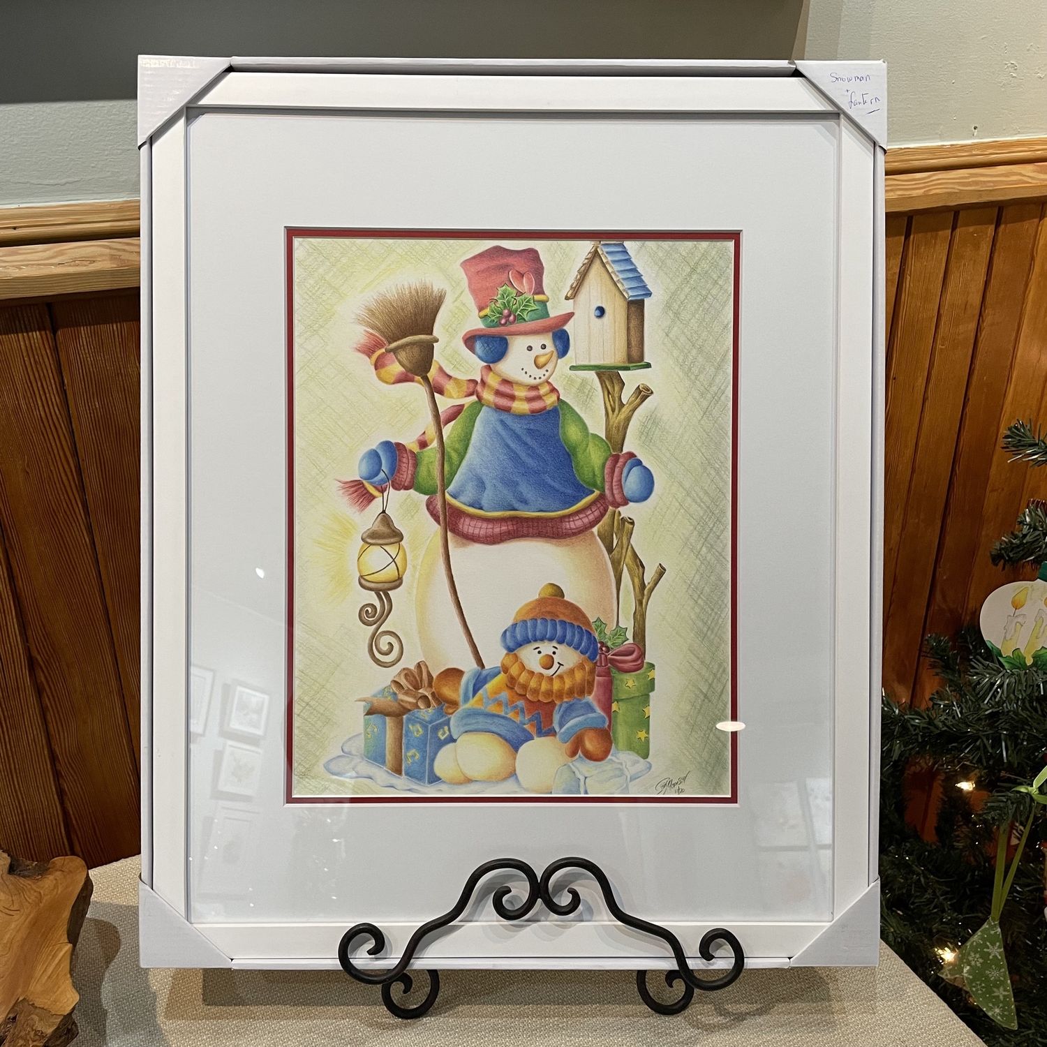 Snowman with lantern and small snowman