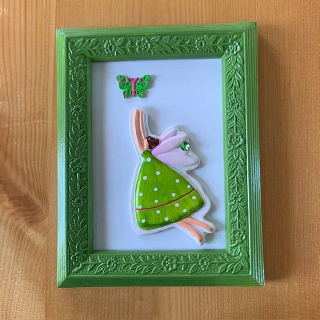 Little girl with butterfly