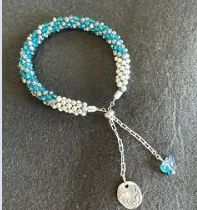 Bracelets woven on a Kumihimo disc