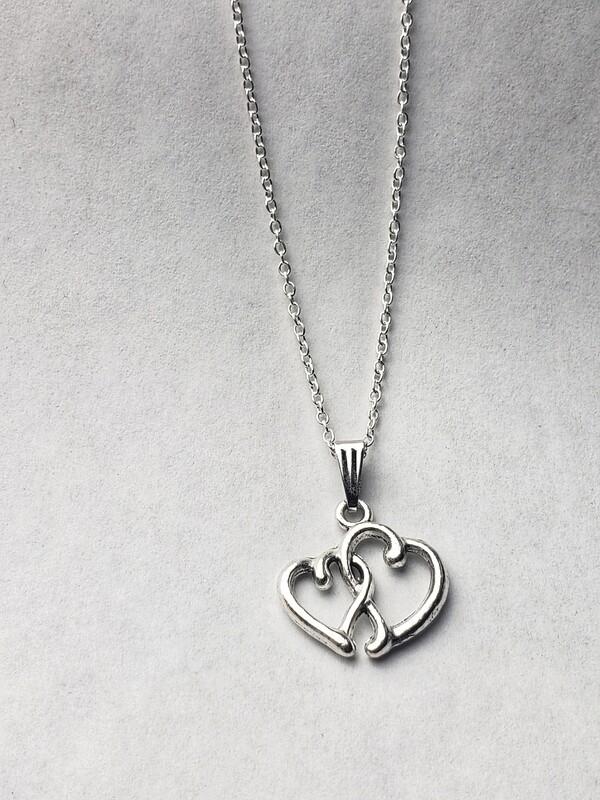 silver necklace with heart pendant