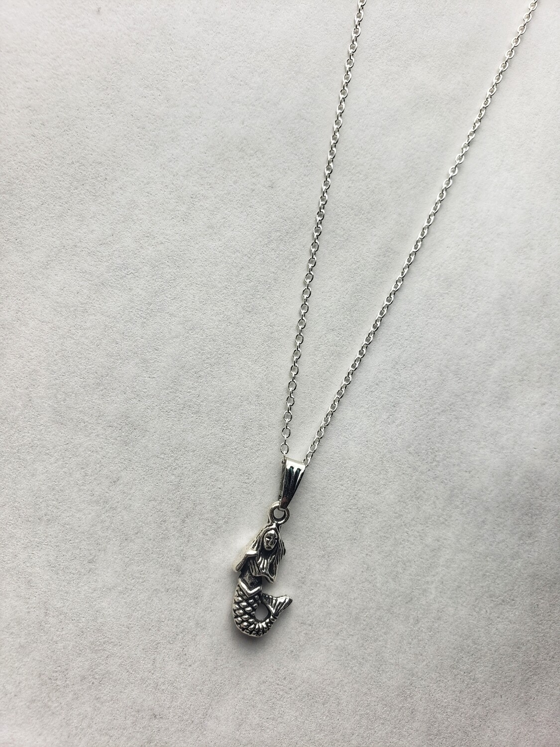 silver necklace with mermaid pendant