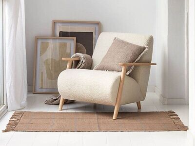 Upholstered armchair indoors and outdoors