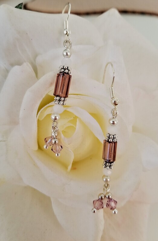 Dangle style glass and Swarovski crystal earrings. A casual dainty look. All purchases come with gift bag.