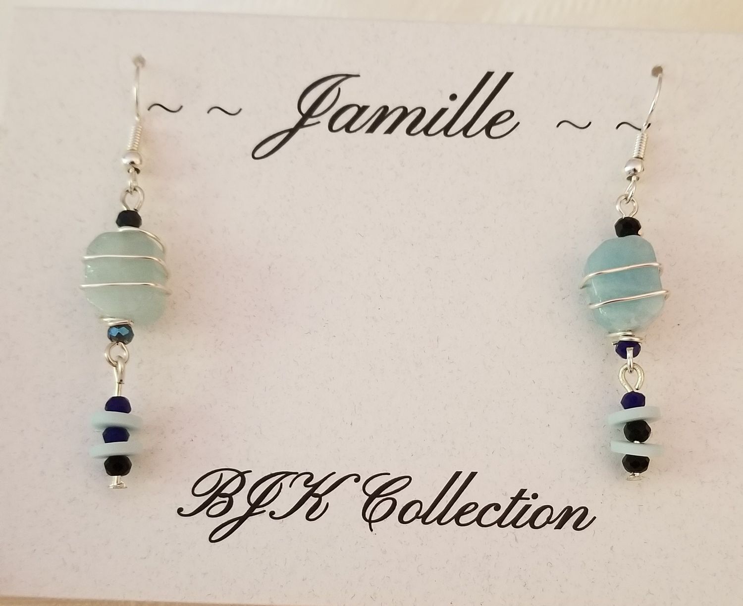Baby blue gemstone wire wrapped earrings.