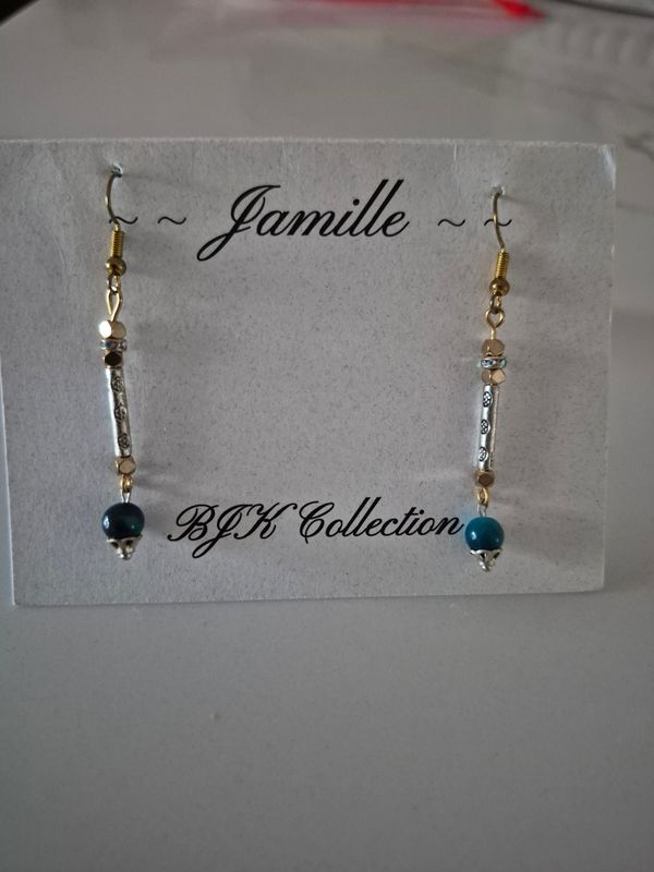 Silver with gold, Lapis Lazuli bead, dangle earrings.