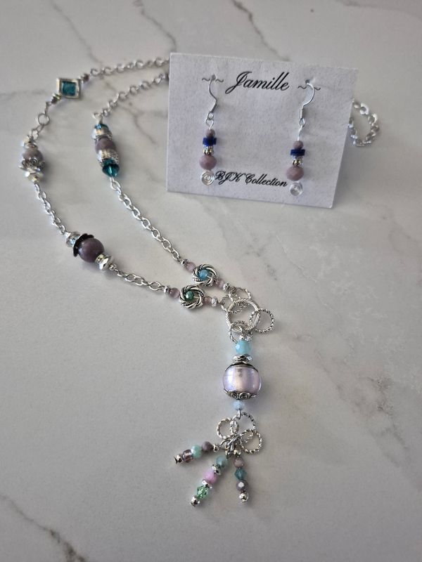 Long style necklace with earrings.