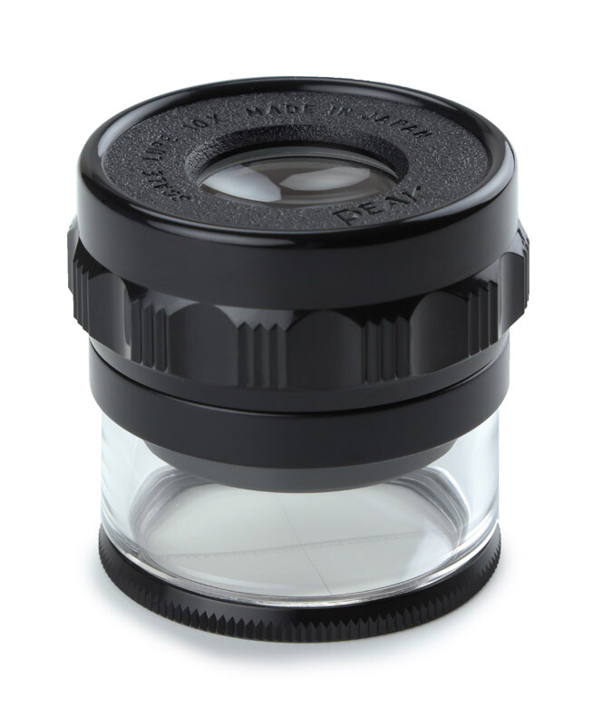 Meetloep 10x vergroting Ø 20 mm oculair. Beeldveld 35 mm. Meetschaal 15-0-15 mm. Verdeling 0,1, 0,5 en 1,0 mm
