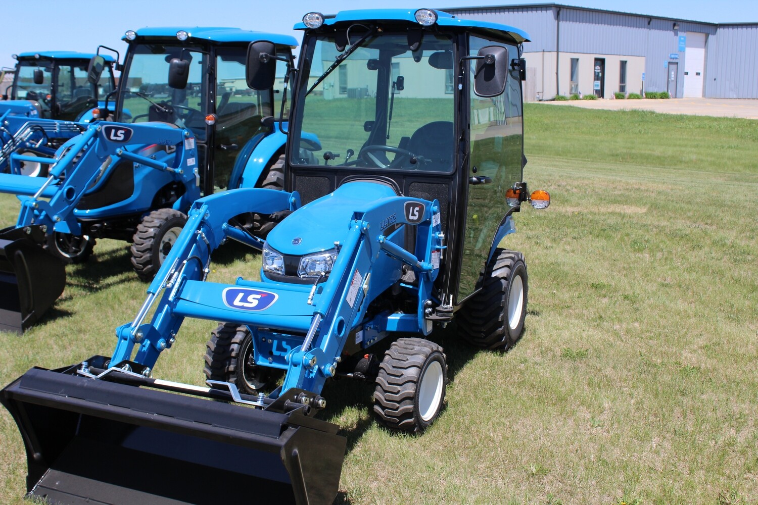 25HP Sub-Compact Tractor with Loader and Cab