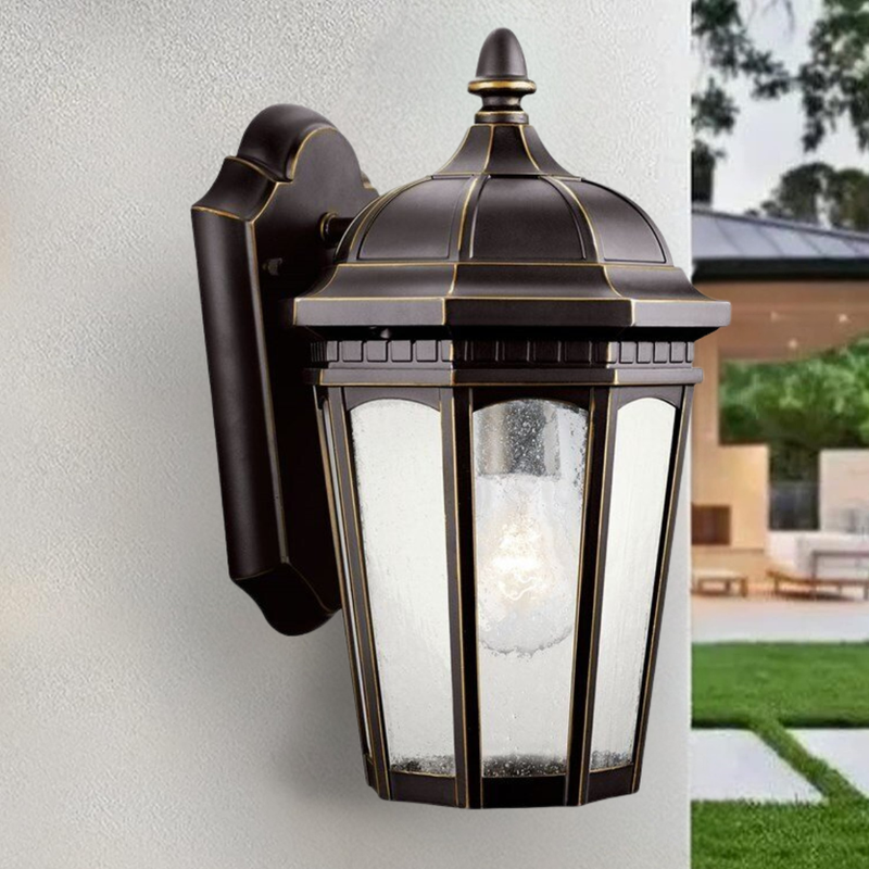 Courtyard 1-Light Outdoor Wall Mount Rubbed Bronze with Clear Seedy Glass