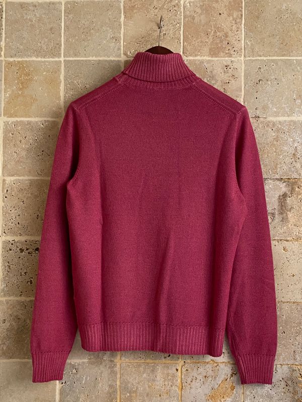 Pull col roulé rose
