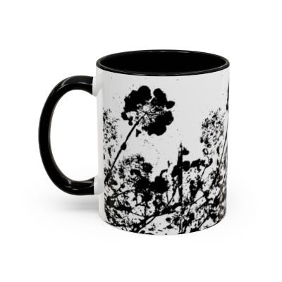 Between two-tone ceramic mug by Eunoia Lumina – minimalist abstract floral artwork. Left side view.