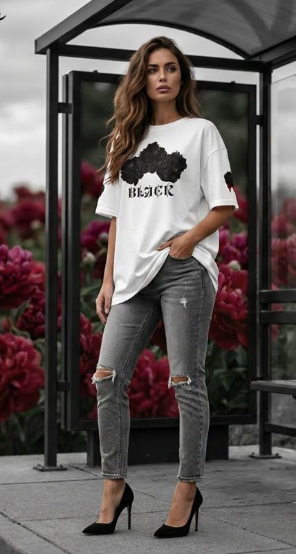 Model wearing BLACK Peony Graphic T-Shirt featuring black peonies design and text "BLACK" in gothic font