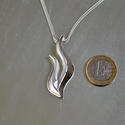 Sassi Design, Tuli riipus