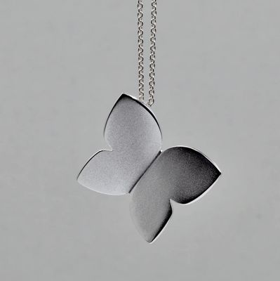 Sassi Design, Heijastuksia perhosriipus