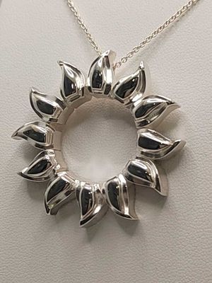 Sassi Design, Aurinko riipus
