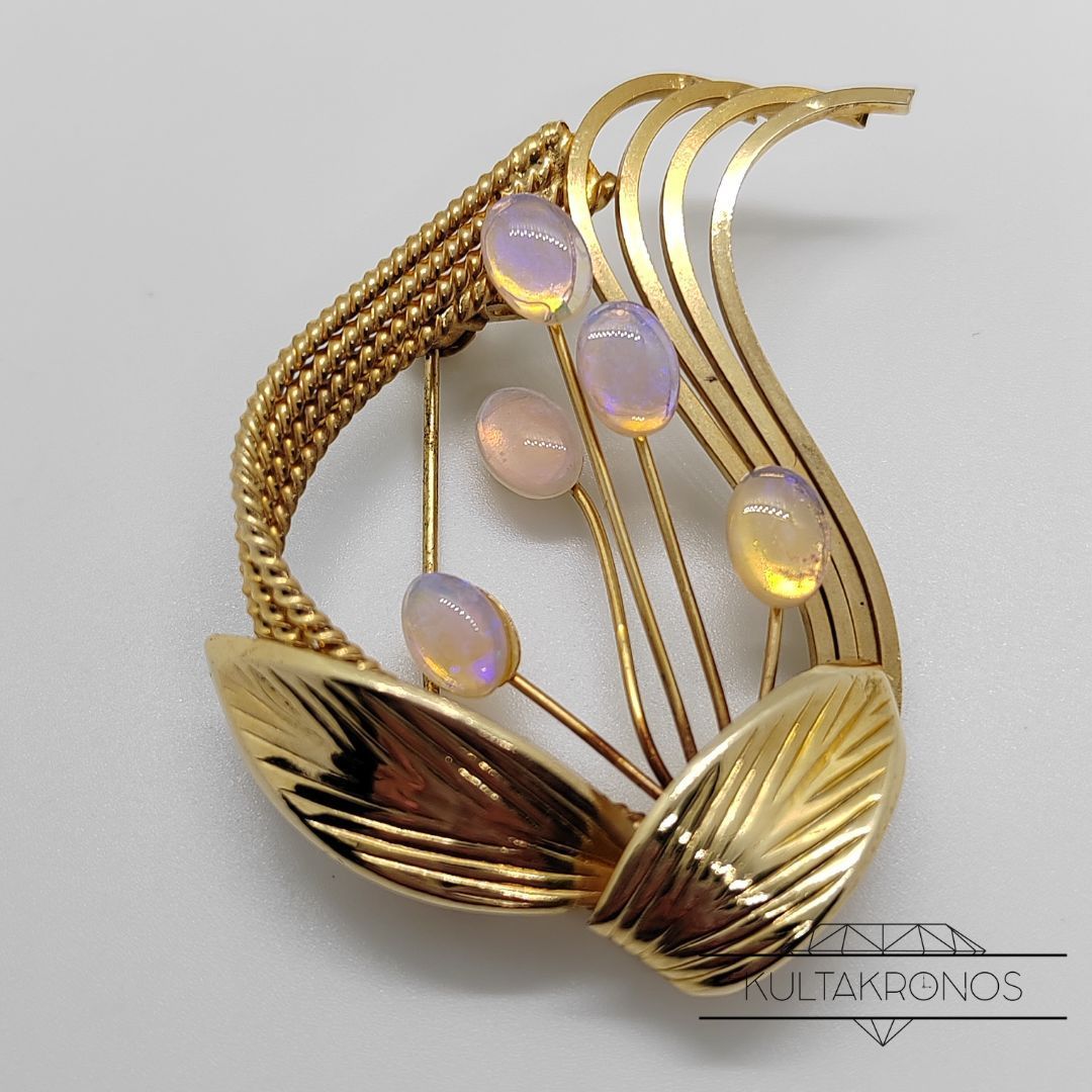 Kullanvärinen rintaneula