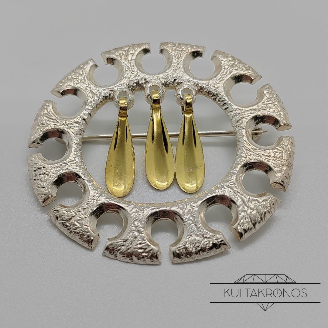 Hopeinen rintakoru - 1969