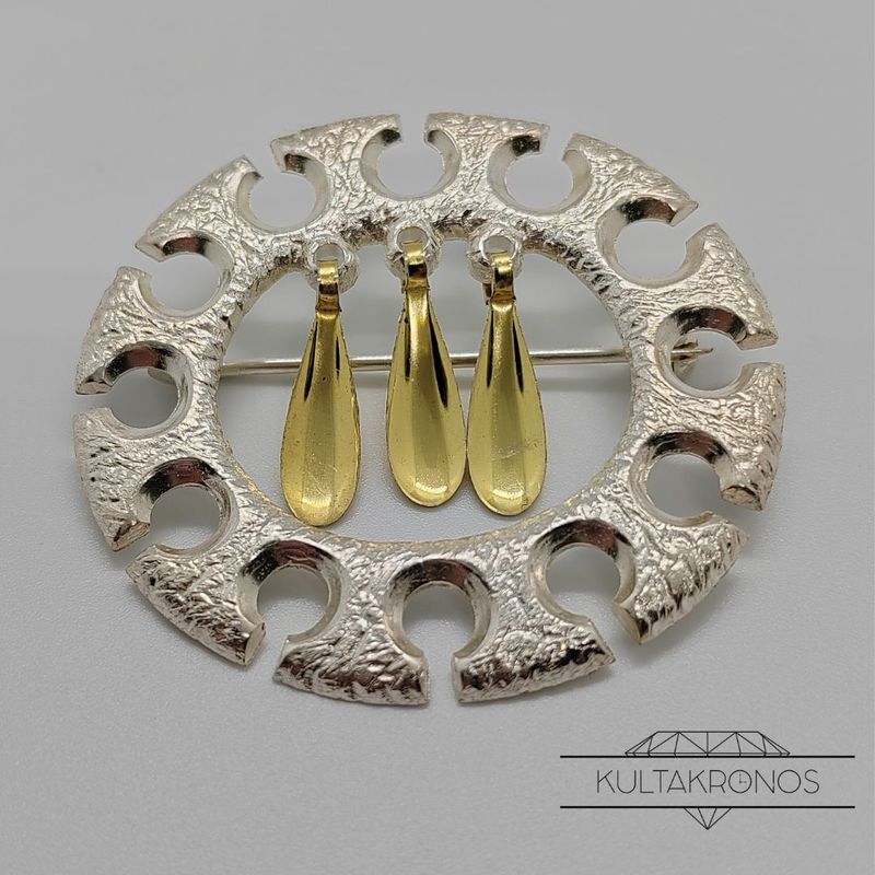 Hopeinen rintakoru - 1969