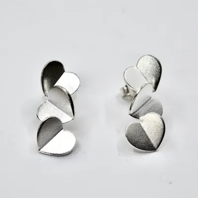 Sassi Design, Heijastuksia sydänkorvakorut