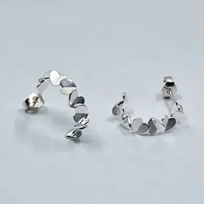 Sassi Design, Heijastuksia korvakorut