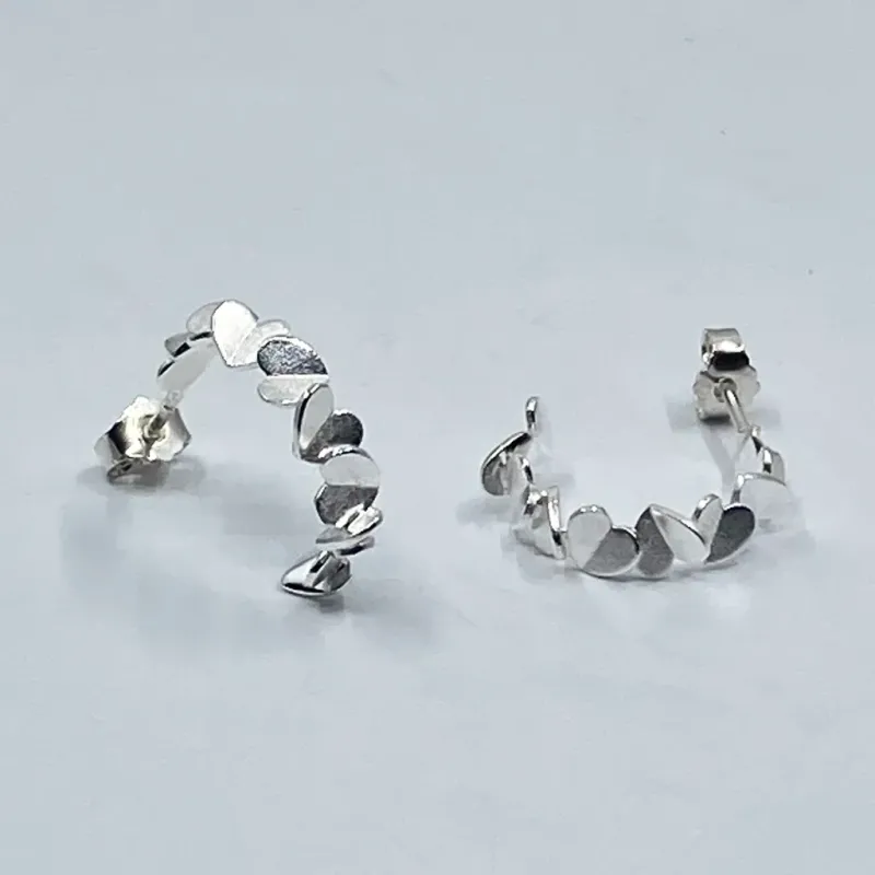 Sassi Design, Heijastuksia korvakorut