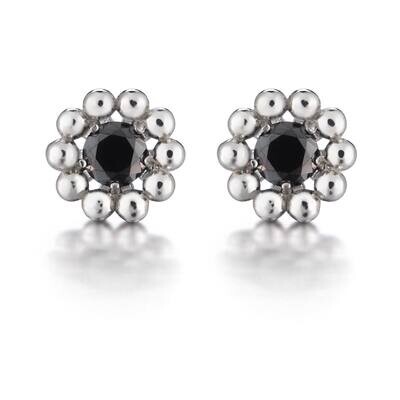 Lumoava Daisy korvakorut mustalla kivellä