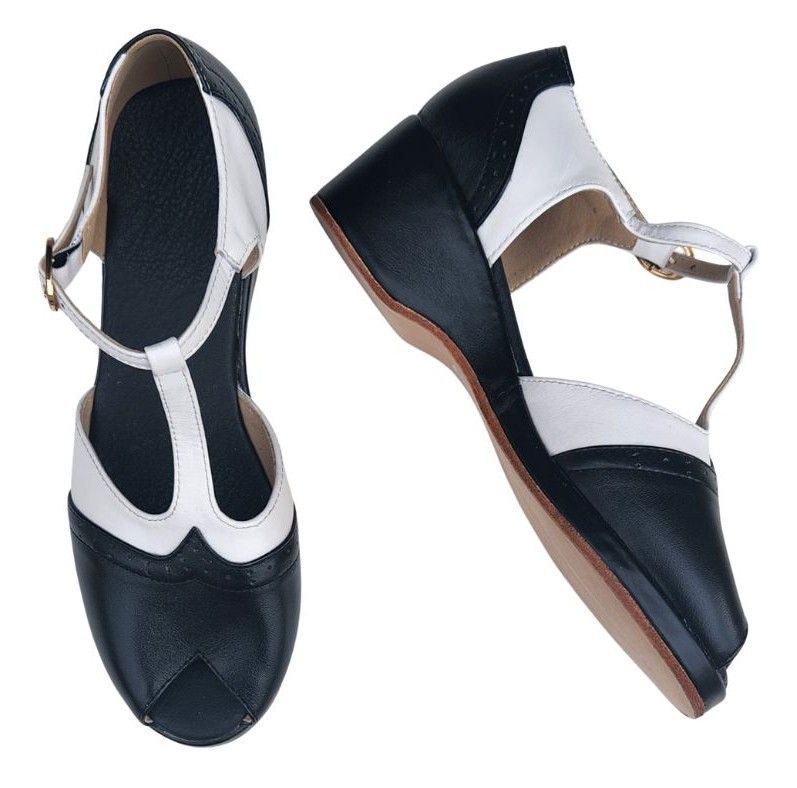 M-0906 - Black / White Leather, Leather Sole, 5cm wedge heel. Heel and Colour options available. M-0906 - Black / White Leather, Leather Sole, 5cm wedge heel. Heel and Colour options available.