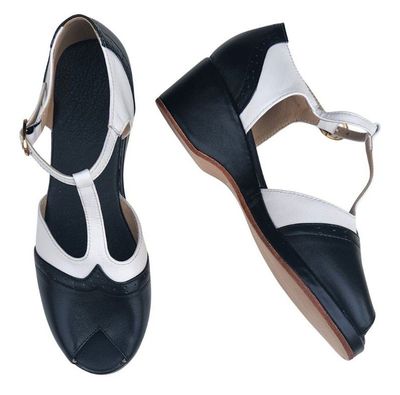 M-0906 - Black / White Leather, Leather Sole, 5cm wedge heel. Heel and Colour options available. M-0906 - Black / White Leather, Leather Sole, 5cm wedge heel. Heel and Colour options available.