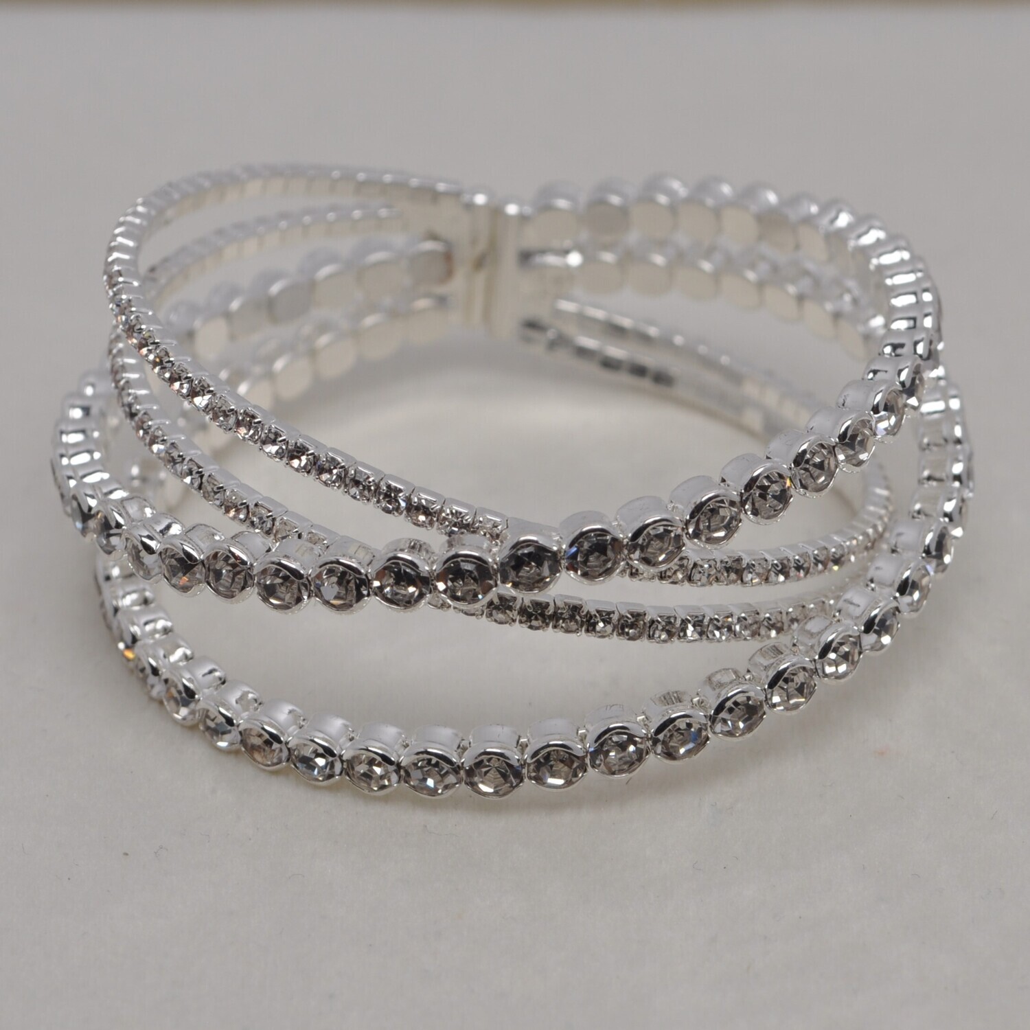 J84249B1S CZ/S RND &amp; SML STN CRSS-CRSS CUFF BRAC