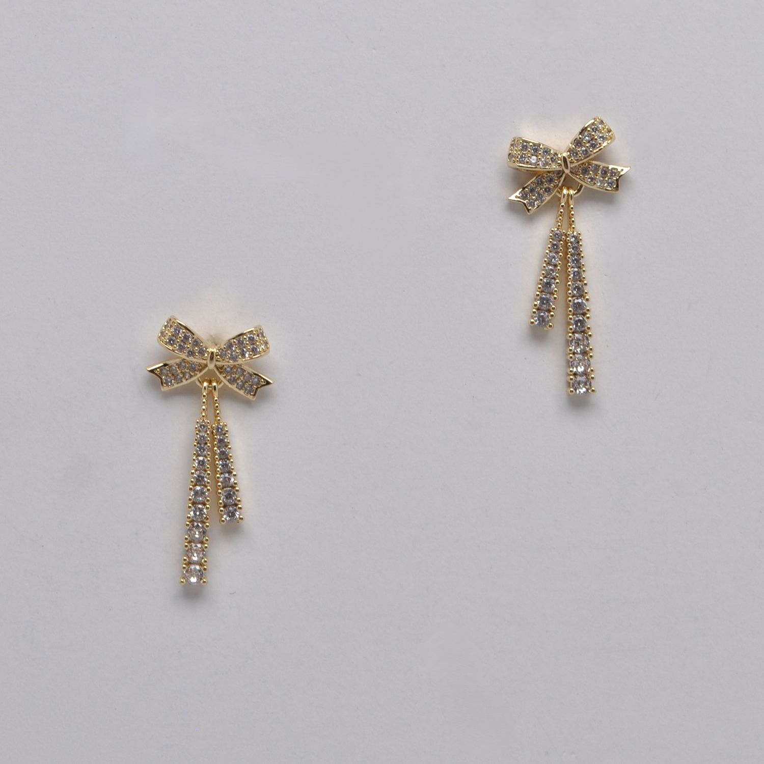 YJ2597E1G CZ/G BOW DNGL EAR