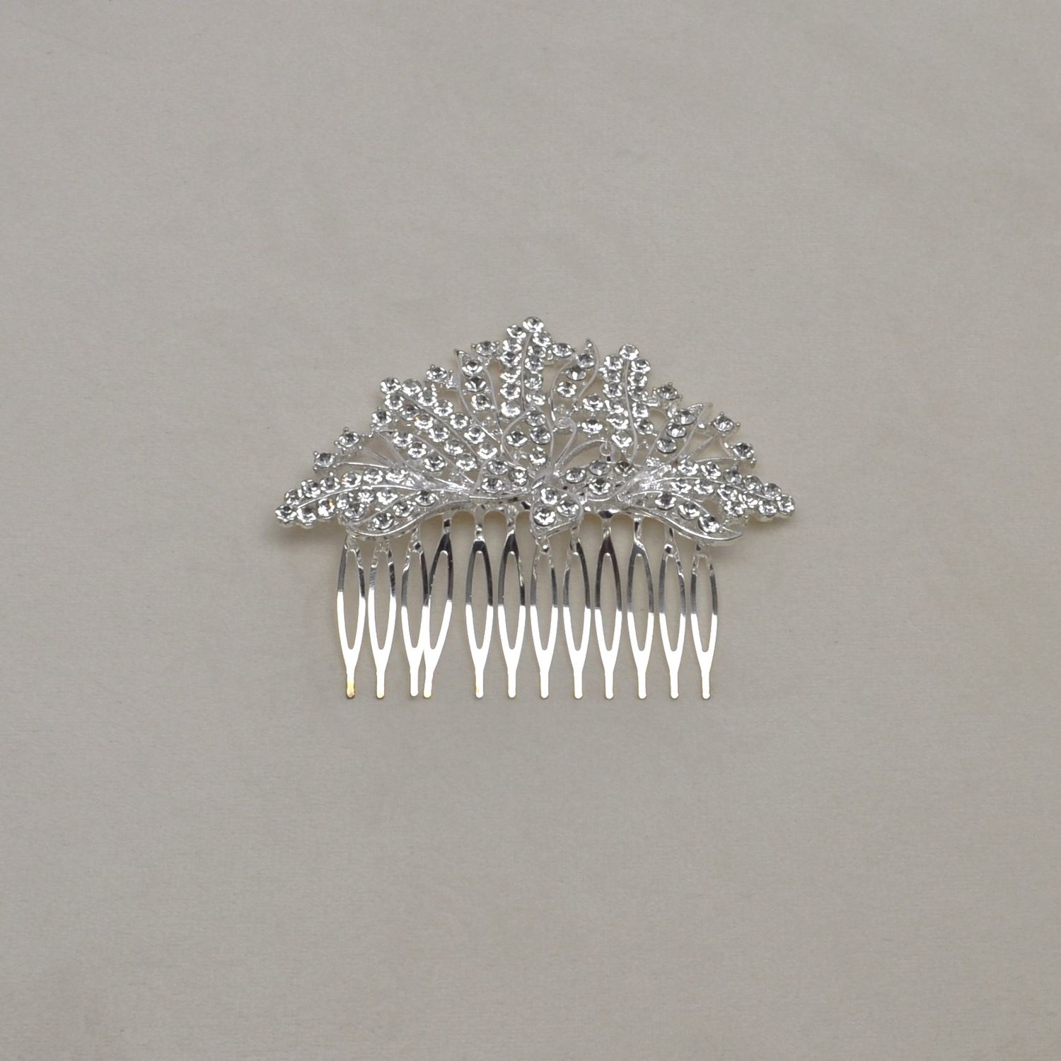 HJ6586H1S CLR/S CRY BUTTRFLY COMB