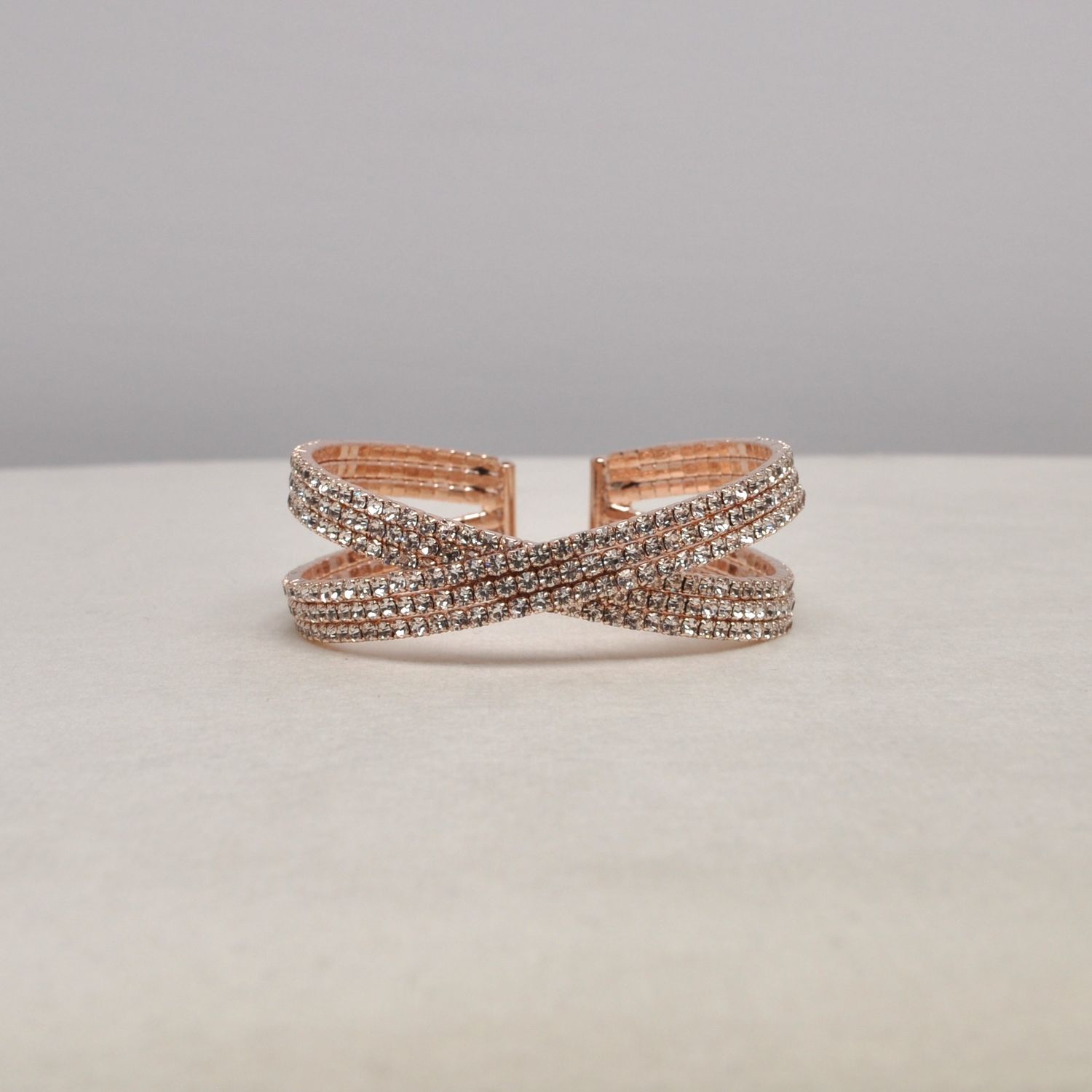 J83485B1RG CLR/RG  3 ROWS CRSS-OVR CUFF BRAC