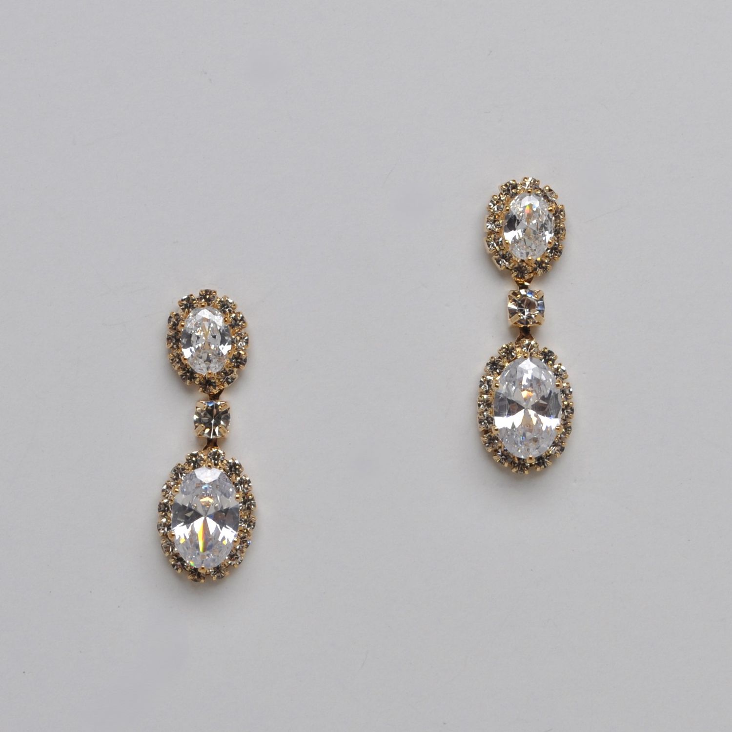 CR10831E1G CZ/G TWO OVAL STNS DNGL ER