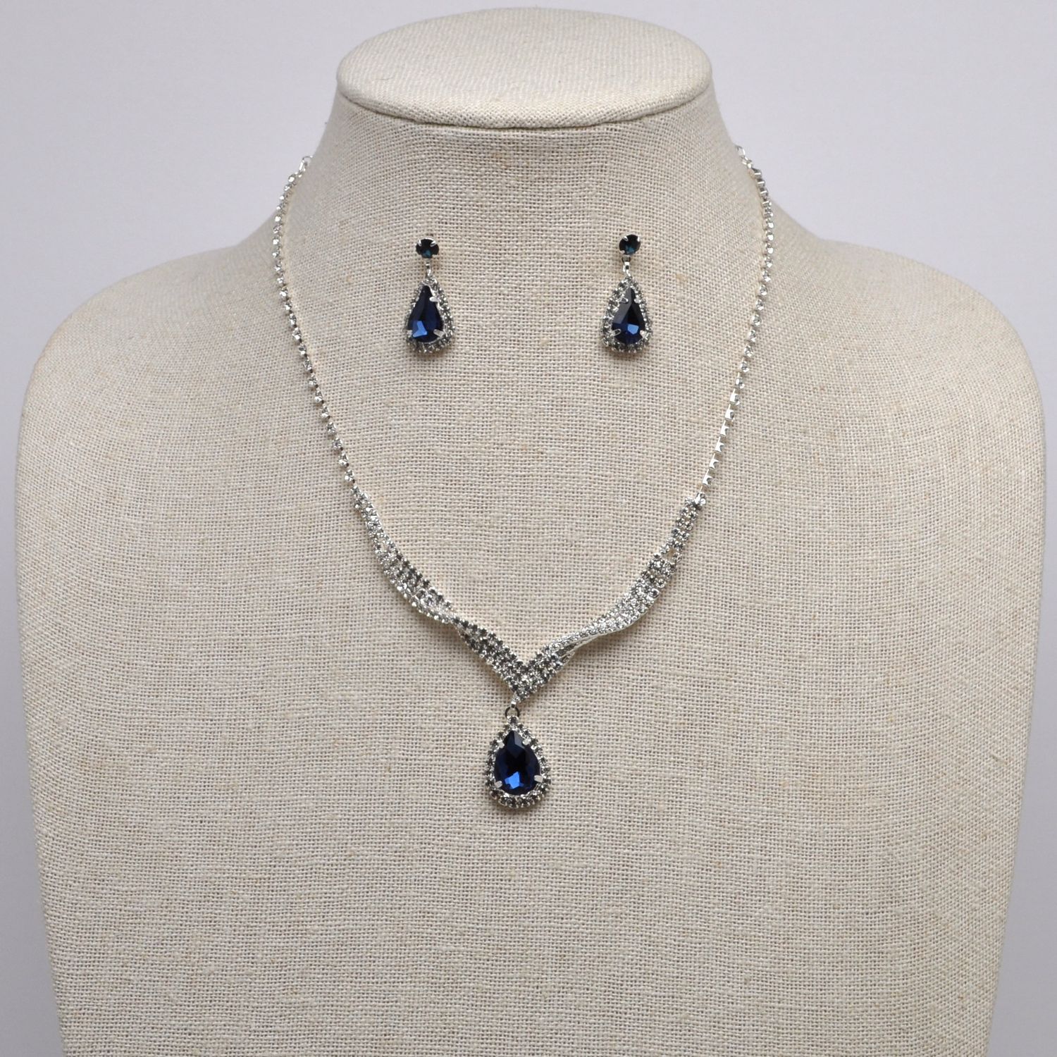 J15494S8S1 MON/S TWISTED TRDRP STONE SET