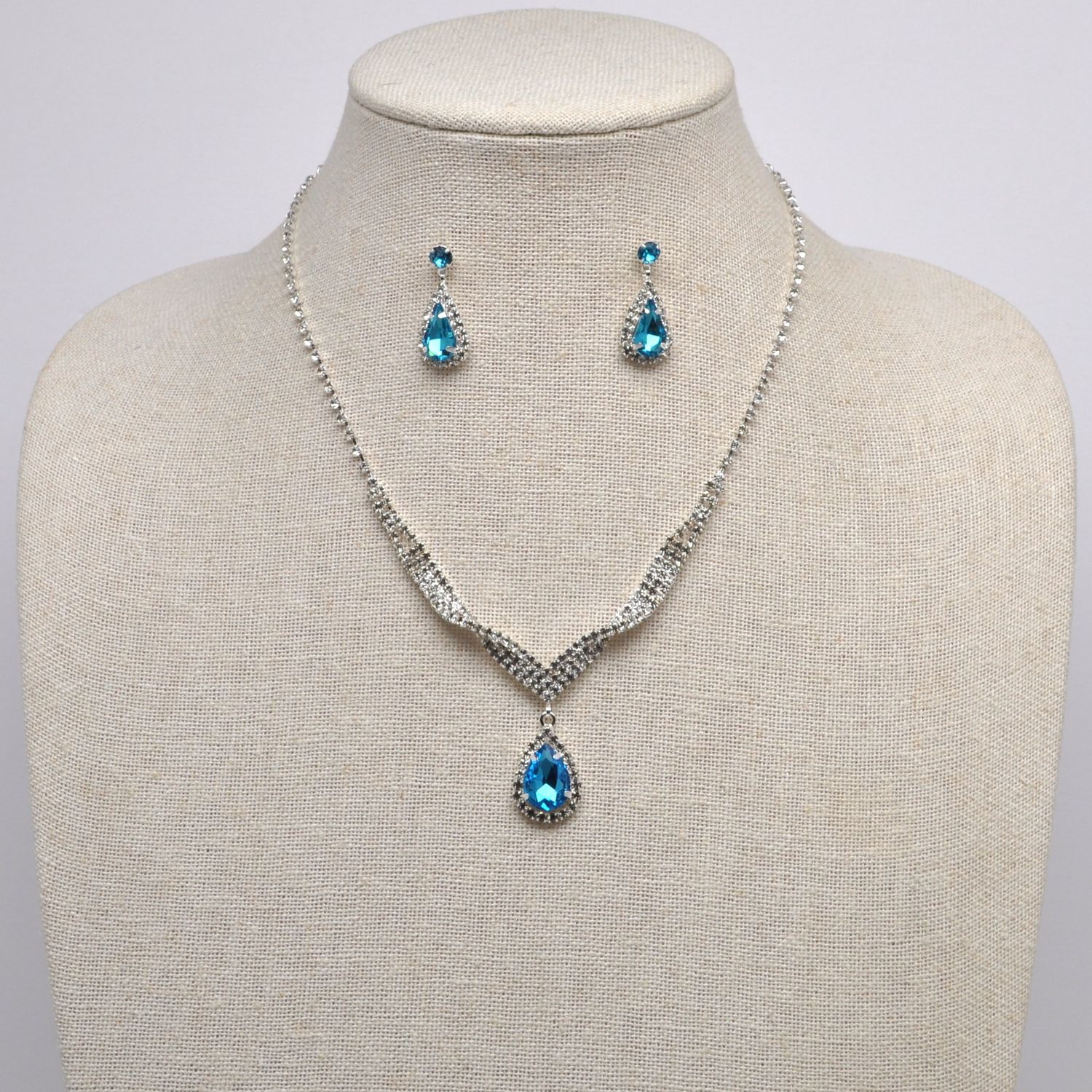 J15494S13S1 AQUA/S TWISTED TRDRP STONE SET