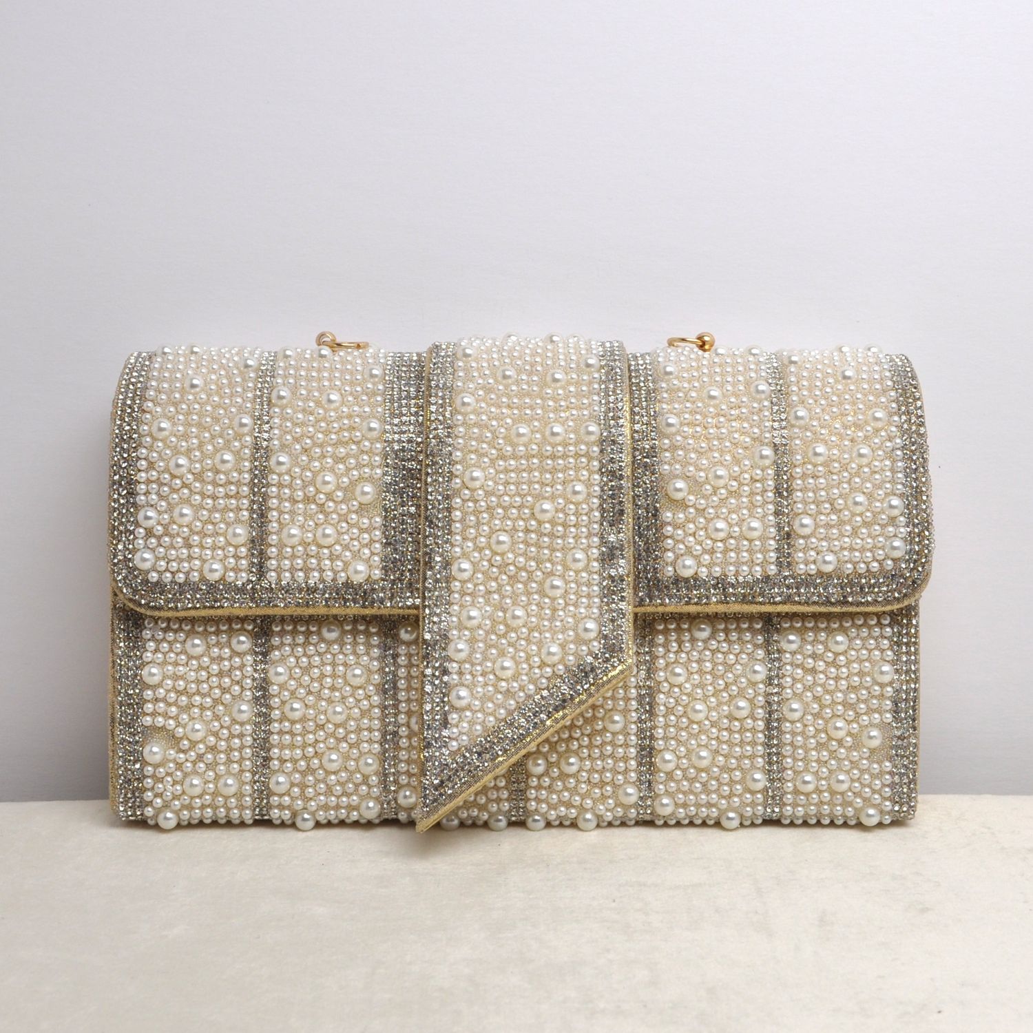 HF0179CGOLD PEARL BUCKL-LK PURS