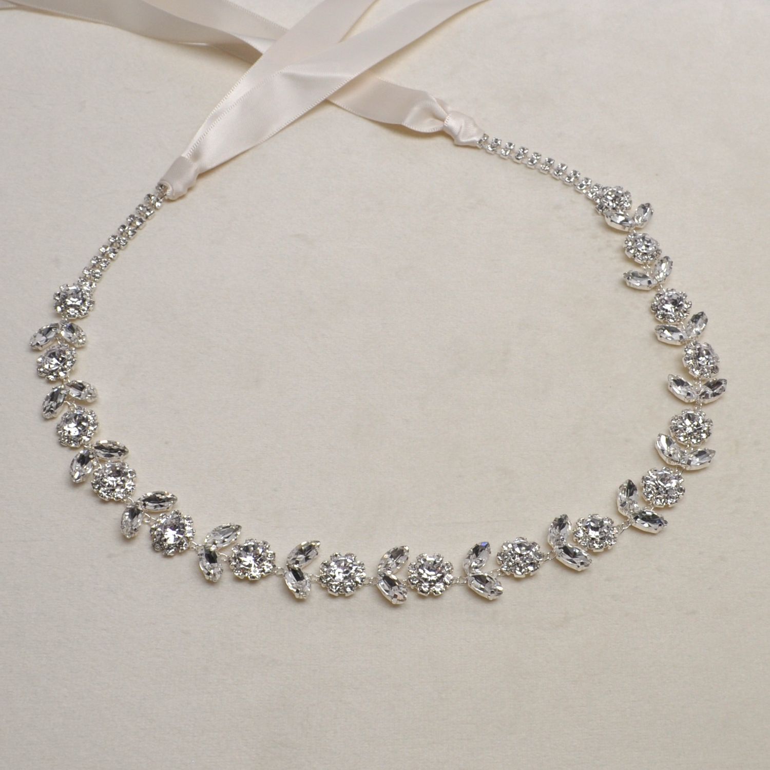 J59176L1S CLR/S FLOWER SHP ONE ROW BELT