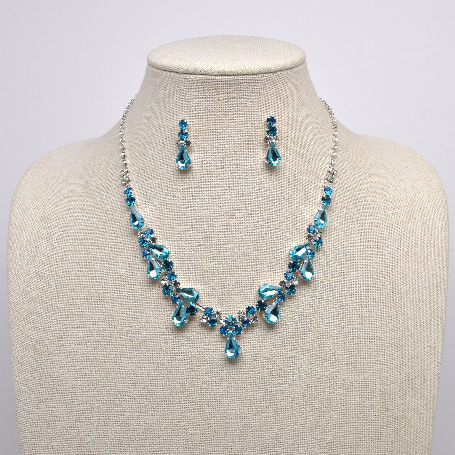 J15482S13S AQUA/S MULTI STONE CLUSTER SET