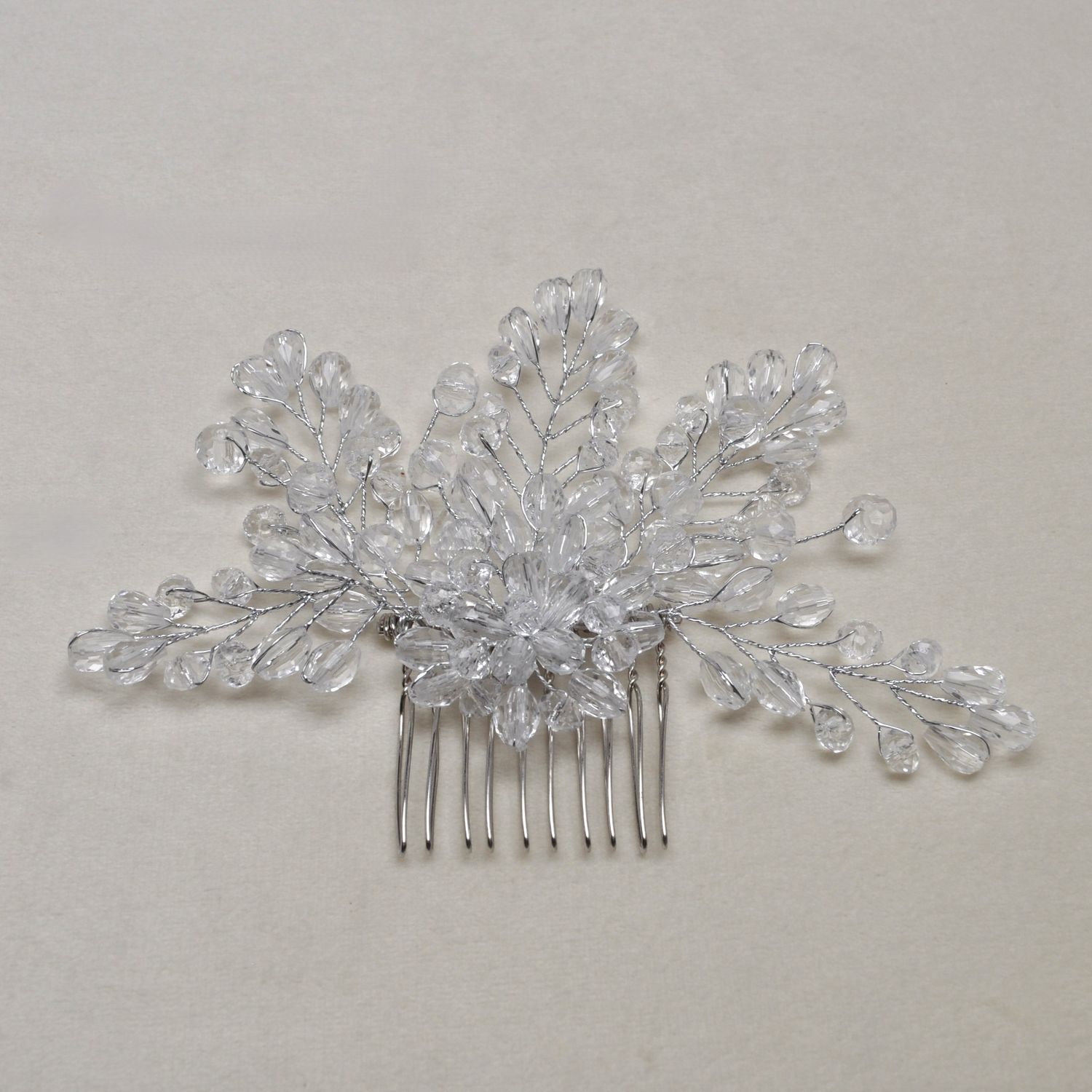 HJ6964H1S CLR/S FLWR BEADED COMB