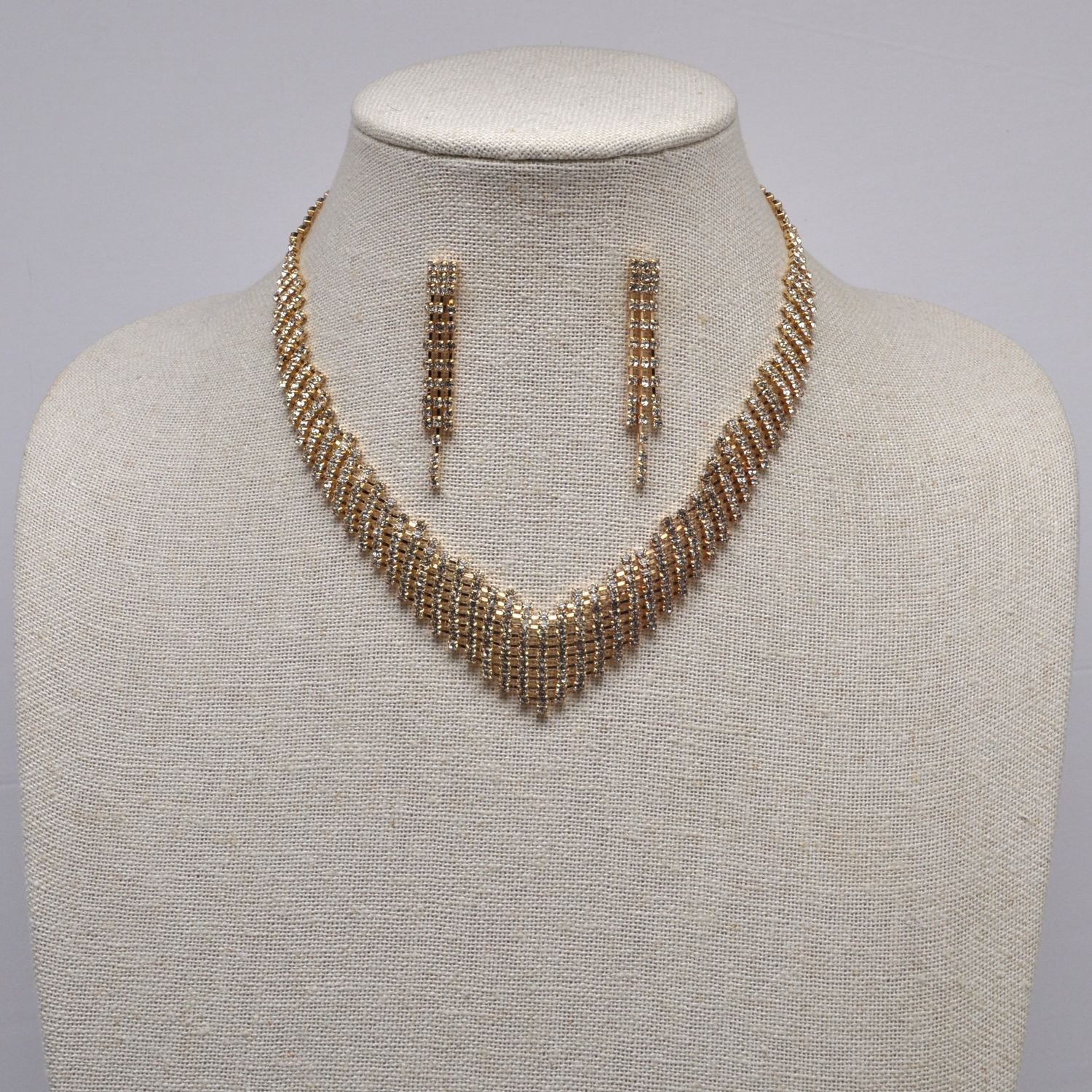J18534S1G CLR/G V-SHP NECK SET