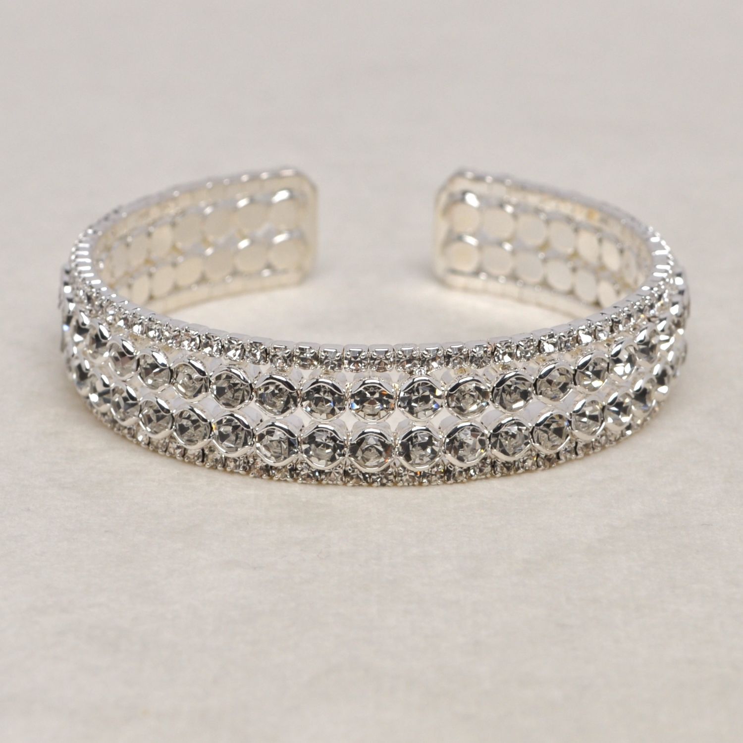 J83503B1S CLR/S 4 ROW SML &amp; RND STNS CUFF BRAC