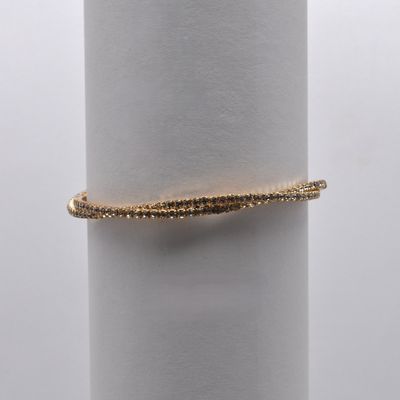 J83487B1G CLR/G  2 LINE TWSTD CUFF BRAC