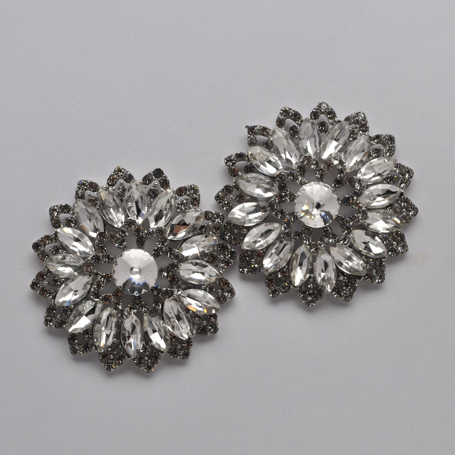 SI2460E1S CRY/S RND SWRLY FLWR MARQ ER