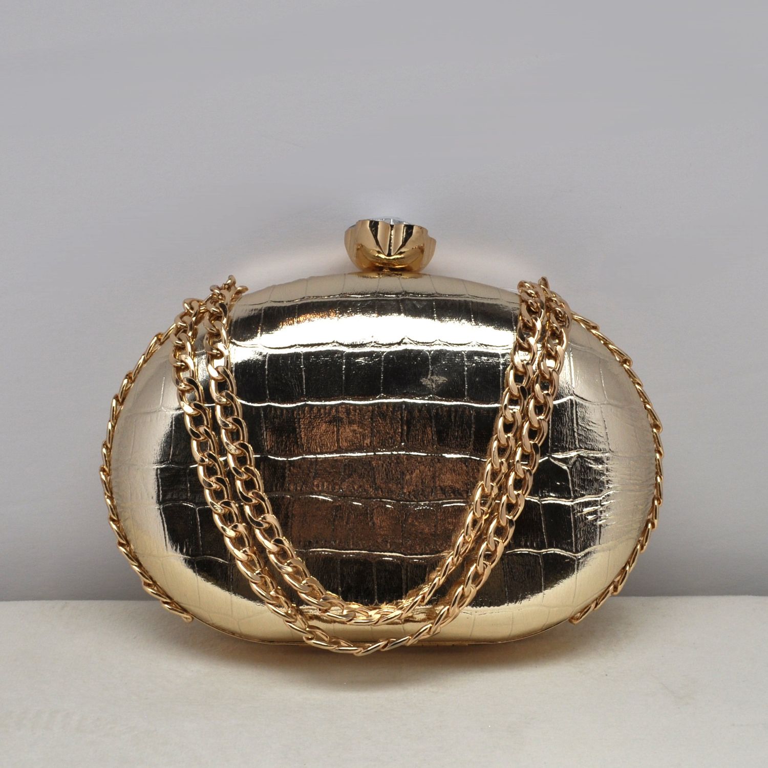 HF0145CGOLD GOLD EMBSD METALIC CHN HNDL PR