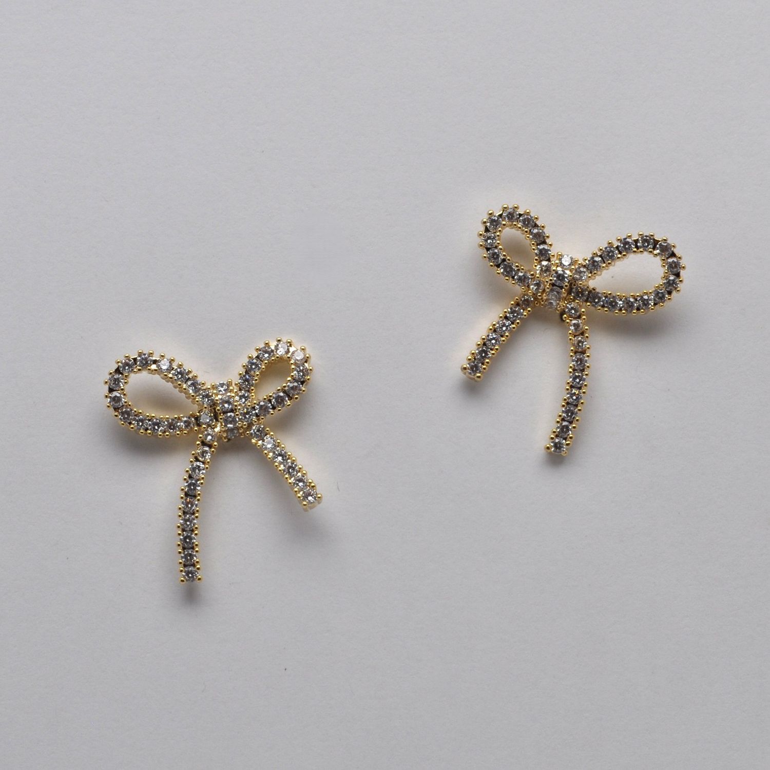 LB10163E1G CZ/G BOW TIED RIBBON  EAR