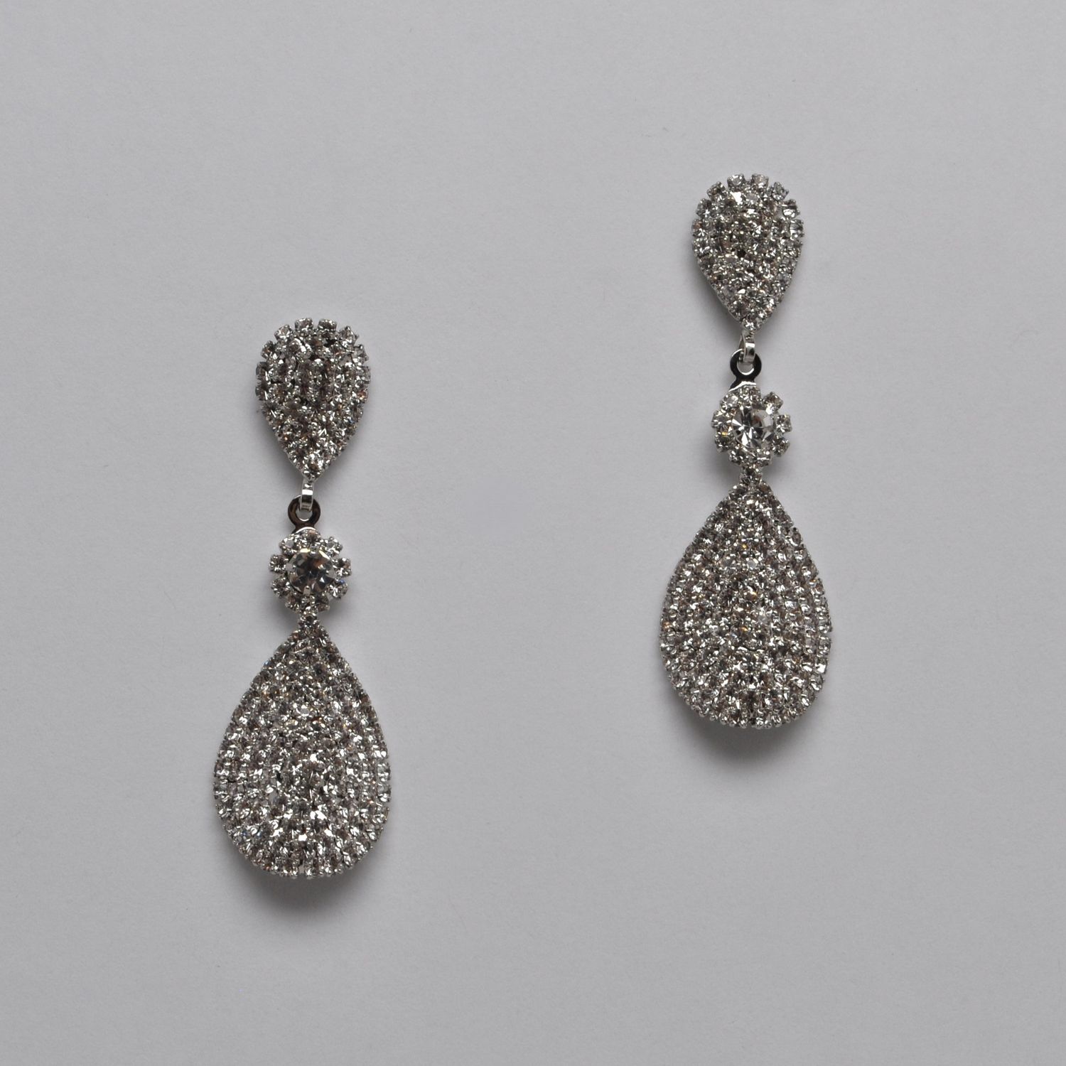 EN6437E1S CLR/S THREE LNKD OVL PST EAR