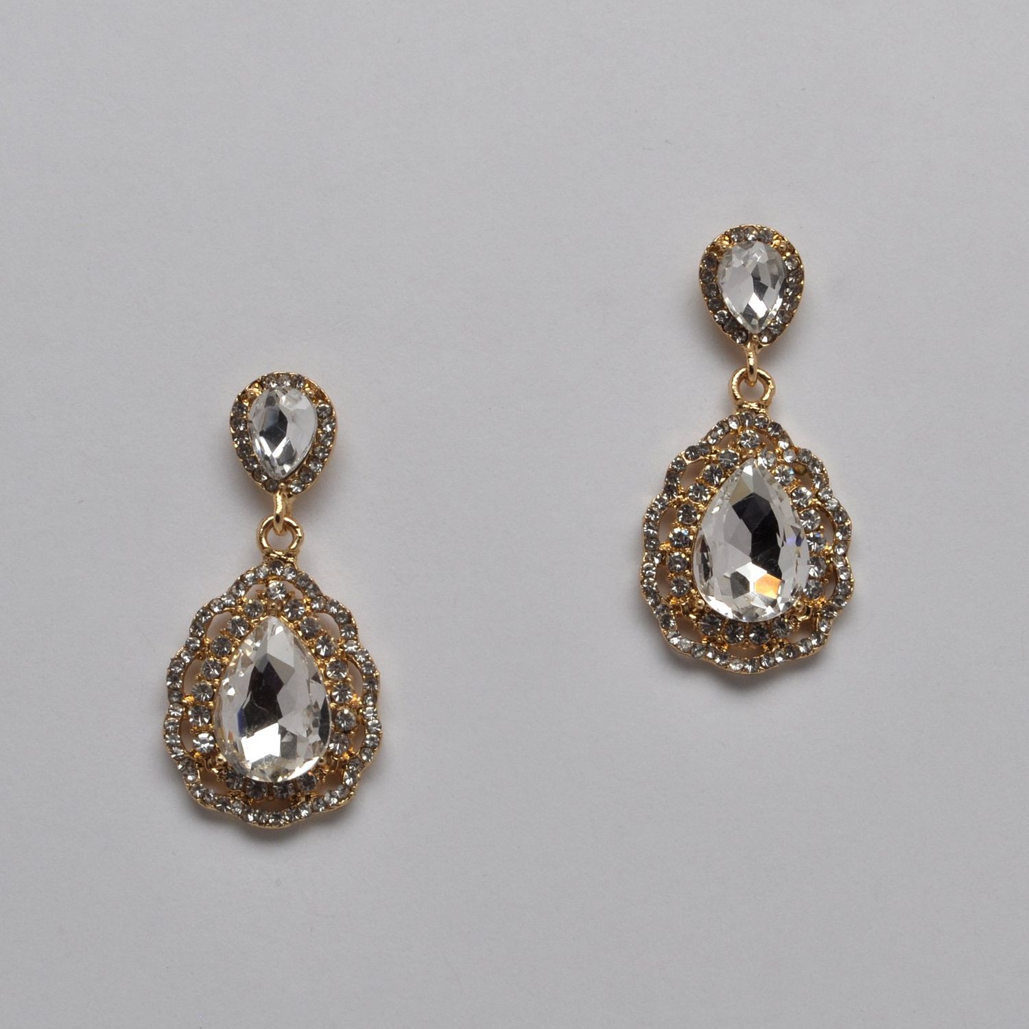 YJ1980E1G CLR/G LNKD FRMD TRDP CRY EAR